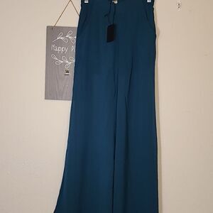 Uniq Green Sheer Pants with Shorts under.